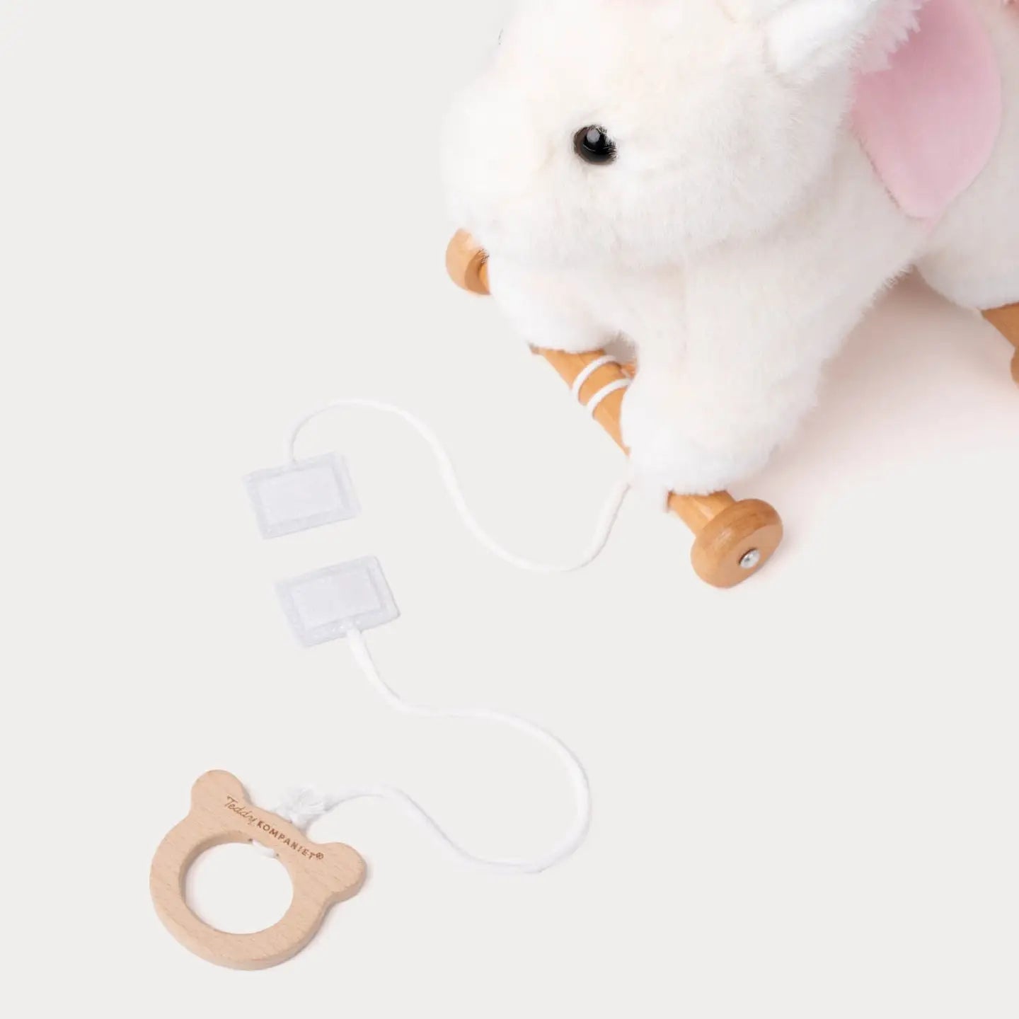 Nachziehtier süßes Einhorn von Teddykompaniet, abnehmbar von Holzrädern