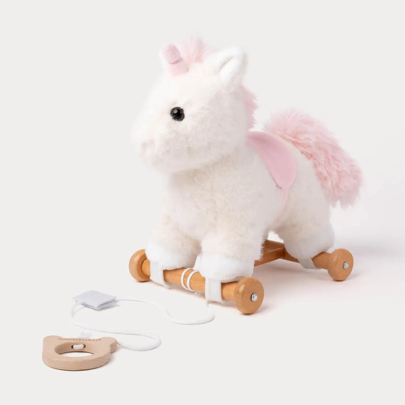 Nachziehtier süßes Einhorn von Teddykompaniet, abnehmbar von Holzrädern