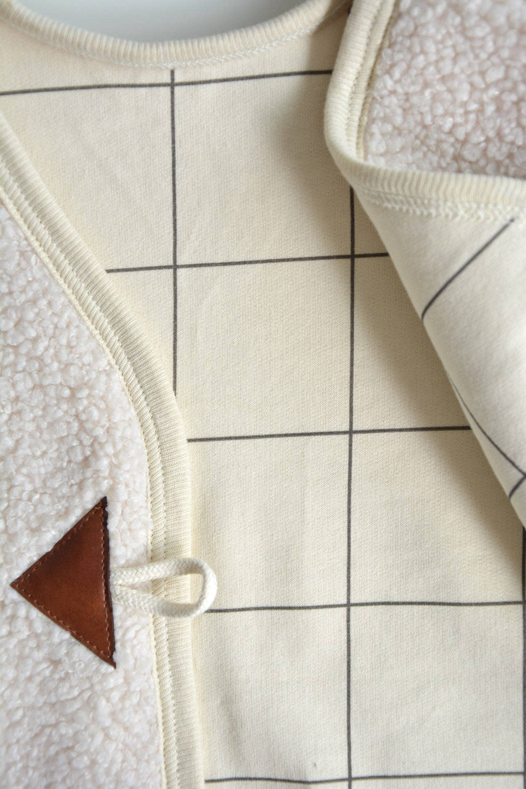 Unisex Baby-Kleinkind Teddyweste mit kariertem Futter