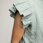 Zauberhaftes und hochwertiges Musselinkleid mit Rüschenkragen und stufigem Rockteil