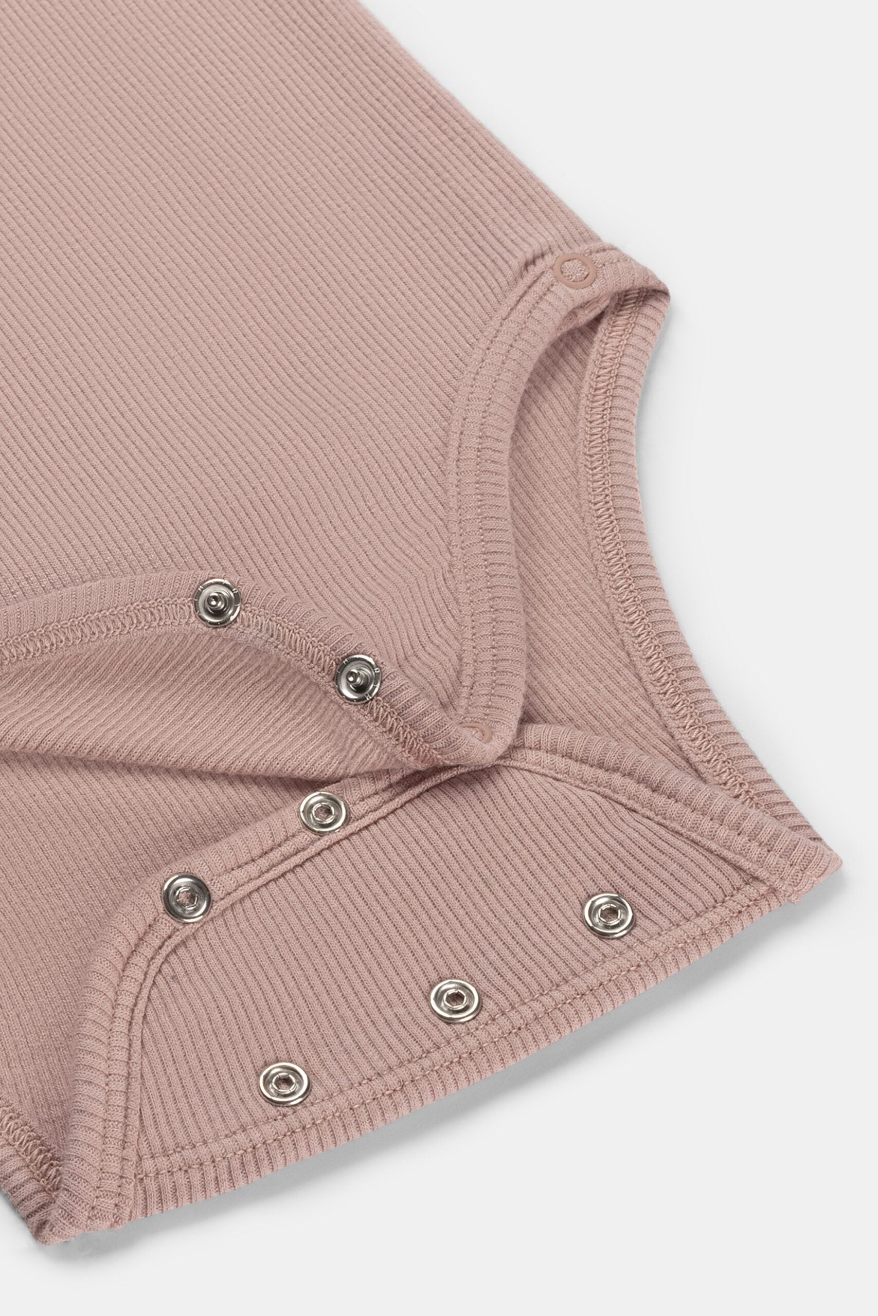 Gerippter Babybody aus 100% Biobaumwolle GOTS zertifiziert und größenverstellbar