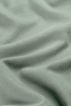 Gerippter Babybody aus 100% Biobaumwolle GOTS zertifiziert und größenverstellbar Farbe sage noch in Gr. 50/56 !