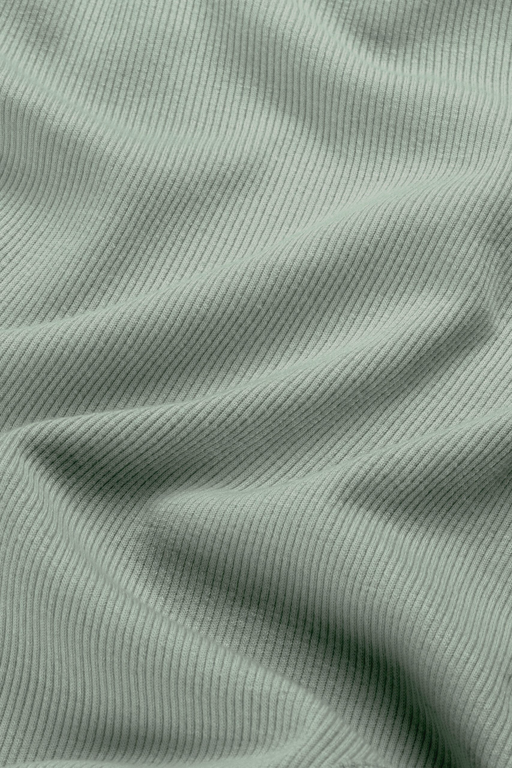 Gerippter Babybody aus 100% Biobaumwolle GOTS zertifiziert und größenverstellbar Farbe sage noch in Gr. 50/56 !