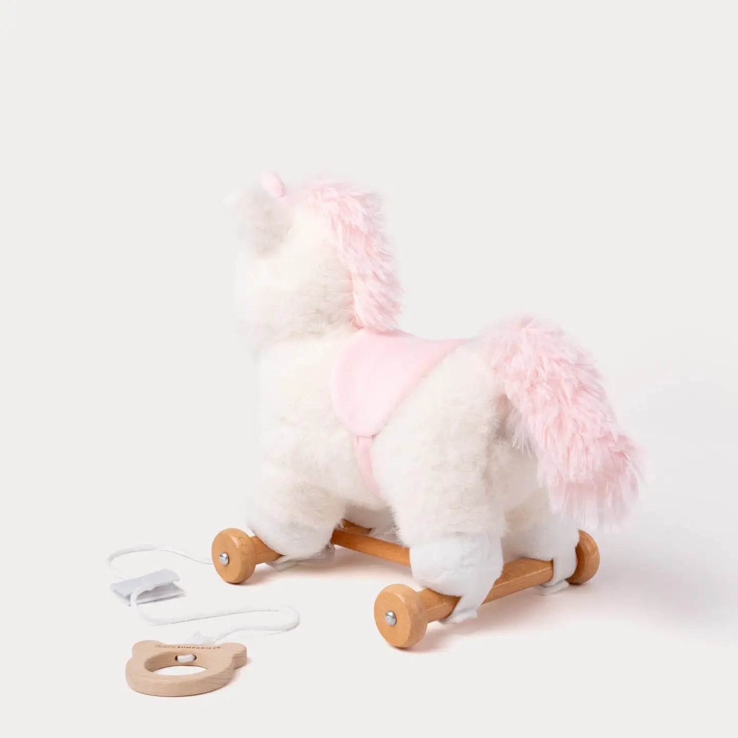 Nachziehtier süßes Einhorn von Teddykompaniet, abnehmbar von Holzrädern